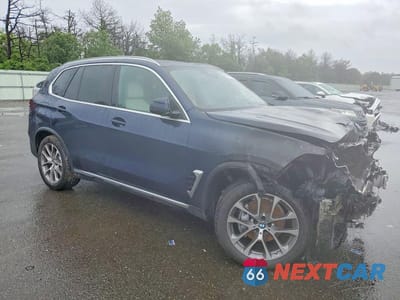 Czwarte zdjęcie samochodu z boku: 2026 BMW X5 XDRIVE40I VIN:5UX23EU07T9478051 - miniatura
