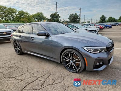 Czwarte zdjęcie samochodu z boku: 2019 BMW 330XI VIN:WBA5R7C52KAE83127 - miniatura