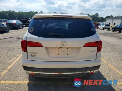 Zdjęcie 6 z 13 samochodu: 2018 HONDA PILOT TOURING VIN:5FNYF5H98JB007959 - miniatura