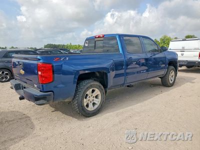 Trzecie zdjęcie samochodu z tyłu: 2018 CHEVROLET SILVERADO K1500 LT VIN:3GCUKREC9JG415138 - miniatura