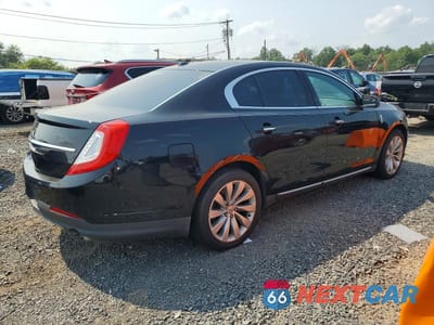 Trzecie zdjęcie samochodu z tyłu: 2016 LINCOLN MKS VIN:1LNHL9EK9GG603194 - miniatura