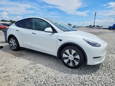 Czwarte zdjęcie samochodu z boku: 2023 TESLA MODEL Y VIN:7SAYGAEE1PF780520 - miniatura