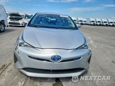 Piąte zdjęcie samochodu w środku: 2017 TOYOTA PRIUS TWO VIN:JTDKBRFU6H3042863 - miniatura