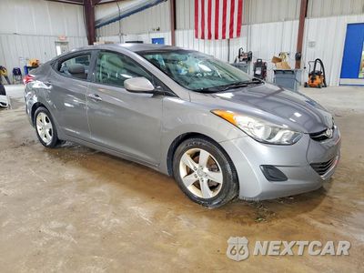 Czwarte zdjęcie samochodu z boku: 2013 HYUNDAI ELANTRA GLS VIN:5NPDH4AE4DH390203 - miniatura