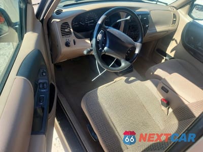 Zdjęcie 8 z 12 samochodu: 1999 FORD RANGER SUPER CAB VIN:1FTYR14V8XPB73464 - miniatura