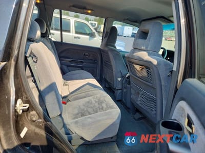 Zdjęcie 10 z 12 samochodu: 2003 HONDA PILOT EX VIN:2HKYF18453H607176 - miniatura