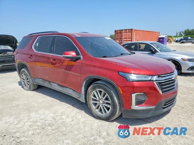 Czwarte zdjęcie samochodu z boku: 2023 CHEVROLET TRAVERSE LT VIN:1GNERGKW6PJ127949 - miniatura