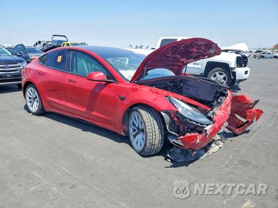 Czwarte zdjęcie samochodu z boku: 2022 TESLA MODEL 3 VIN:5YJ3E1EB1NF132546 - miniatura