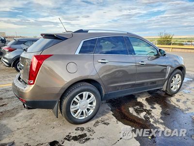 Trzecie zdjęcie samochodu z tyłu: 2016 CADILLAC SRX LUXURY COLLECTION VIN:3GYFNEE37GS587838 - miniatura