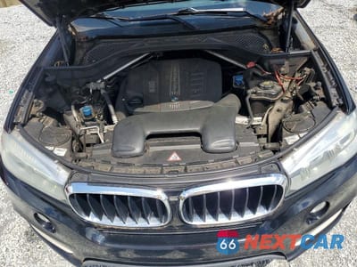 Zdjęcie 12 z 13 samochodu: 2014 BMW X5 XDRIVE35D VIN:5UXKS4C56E0J96663 - miniatura