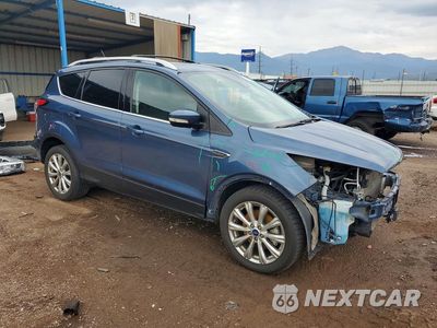 Czwarte zdjęcie samochodu z boku: 2018 FORD ESCAPE TITANIUM VIN:1FMCU9J91JUA09881 - miniatura
