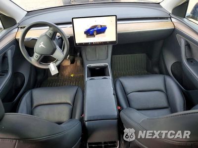 Zdjęcie 8 z 13 samochodu: 2023 TESLA MODEL Y VIN:7SAYGDEE6PF805008 - miniatura