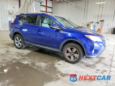 Czwarte zdjęcie samochodu z boku: 2015 TOYOTA RAV4 XLE VIN:2T3RFREV6FW312911 - miniatura