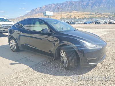 Czwarte zdjęcie samochodu z boku: 2023 TESLA MODEL Y VIN:7SAYGAEE6PF873579 - miniatura