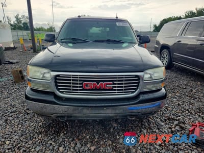 Piąte zdjęcie samochodu w środku: 2003 GMC YUKON XL K1500 VIN:3GKFK16Z53G176322 - miniatura
