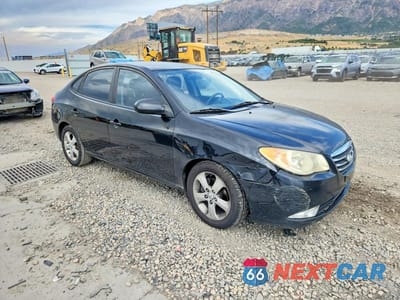Czwarte zdjęcie samochodu z boku: 2010 HYUNDAI ELANTRA SE VIN:KMHDU4AD2AU846201 - miniatura