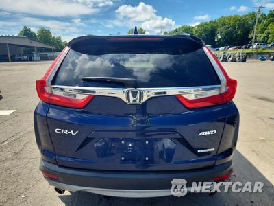 Zdjęcie 6 z 13 samochodu: 2017 HONDA CR-V TOURING VIN:2HKRW2H95HH637128 - miniatura