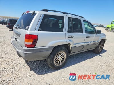 Trzecie zdjęcie samochodu z tyłu: 2002 JEEP GRAND CHEROKEE LAREDO VIN:1J4GW48S72C249997 - miniatura