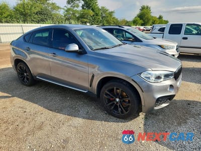 Czwarte zdjęcie samochodu z boku: 2016 BMW X6 XDRIVE35I VIN:5UXKU2C56G0N81853 - miniatura
