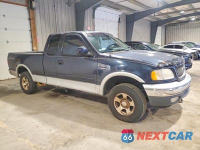 Czwarte zdjęcie samochodu z boku: 2000 FORD F150 VIN:1FTRX18WXYNC25025 - miniatura