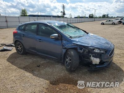 Czwarte zdjęcie samochodu z boku: 2018 FORD FOCUS SEL VIN:1FADP3M26JL258104 - miniatura