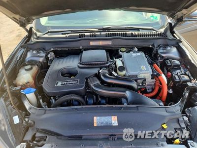Zdjęcie 11 z 12 samochodu: 2013 FORD FUSION SE HYBRID VIN:3FA6P0LU8DR325396 - miniatura