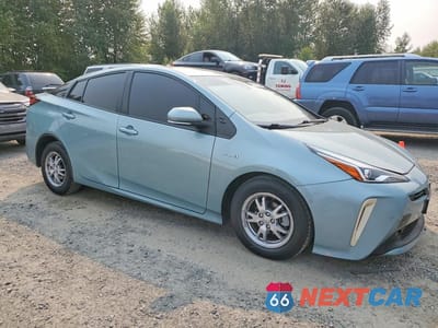 Czwarte zdjęcie samochodu z boku: 2021 TOYOTA PRIUS XLE AWD-E VIN:JTDL9MFU6M3030161 - miniatura