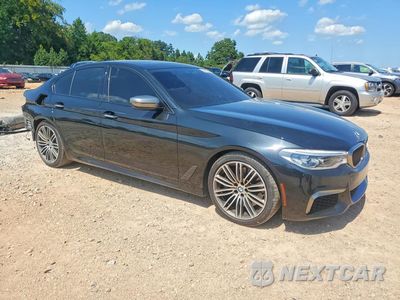 Czwarte zdjęcie samochodu z boku: 2018 BMW M550XI VIN:WBAJB9C53JB287461 - miniatura