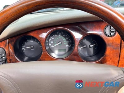 Zdjęcie 8 z 14 samochodu: 1999 JAGUAR XK8 VIN:SAJGX2049XC038524 - miniatura
