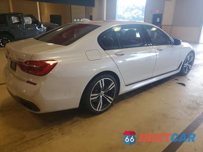 Trzecie zdjęcie samochodu z tyłu: 2019 BMW 750 I VIN:WBA7F0C58KGM25235 - miniatura