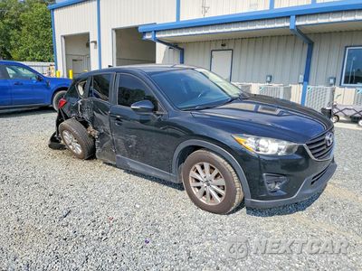 Czwarte zdjęcie samochodu z boku: 2016 MAZDA CX-5 TOURING VIN:JM3KE4CYXG0739560 - miniatura