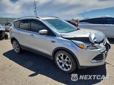Czwarte zdjęcie samochodu z boku: 2016 FORD ESCAPE TITANIUM VIN:1FMCU0JX5GUA10969 - miniatura