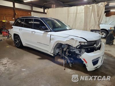 Czwarte zdjęcie samochodu z boku: 2022 JEEP GRAND CHEROKEE SUMMIT 4XE VIN:1C4RJYE65N8530344 - miniatura