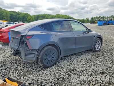 Trzecie zdjęcie samochodu z tyłu: 2023 TESLA MODEL Y VIN:7SAYGDEE5PF980642 - miniatura