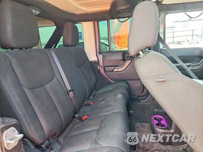 Zdjęcie 10 z 12 samochodu: 2014 JEEP WRANGLER UNLIMITED SPORT VIN:1C4HJWDG7EL246866 - miniatura