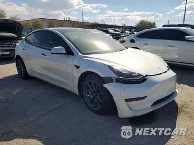 Czwarte zdjęcie samochodu z boku: 2022 TESLA MODEL 3 VIN:5YJ3E1EB9NF204500 - miniatura