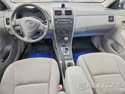 Zdjęcie 8 z 12 samochodu: 2009 TOYOTA COROLLA LE VIN:JTDBL40E799039230 - miniatura