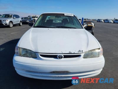 Piąte zdjęcie samochodu w środku: 1999 TOYOTA COROLLA VE VIN:1NXBR12E4XZ142721 - miniatura