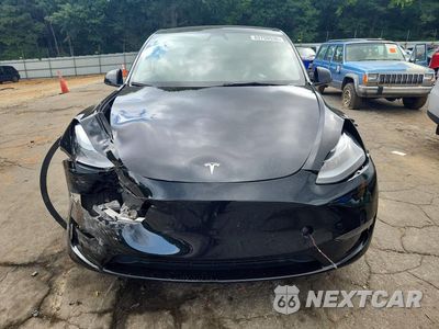 Piąte zdjęcie samochodu w środku: 2025 TESLA MODEL Y VIN:7SAYGDED8SA350238 - miniatura