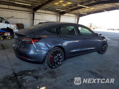 Trzecie zdjęcie samochodu z tyłu: 2023 TESLA MODEL 3 VIN:5YJ3E1EC4PF553379 - miniatura