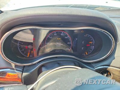 Zdjęcie 9 z 13 samochodu: 2014 JEEP GRAND CHEROKEE OVERLAND VIN:1C4RJECG6EC265716 - miniatura