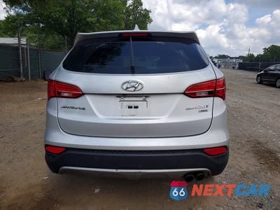 Zdjęcie 6 z 12 samochodu: 2014 HYUNDAI SANTA FE SPORT 2.0T VIN:5XYZWDLA2EG166443 - miniatura