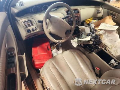 Zdjęcie 8 z 12 samochodu: 2001 TOYOTA AVALON XLS VIN:4T1BF28B31U146231 - miniatura