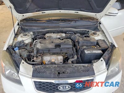 Zdjęcie 11 z 12 samochodu: 2010 KIA RIO BASE VIN:KNADH4A32A6643438 - miniatura