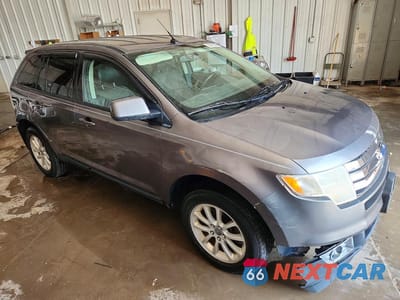 Czwarte zdjęcie samochodu z boku: 2010 FORD EDGE SEL VIN:2FMDK3JC4ABA18888 - miniatura