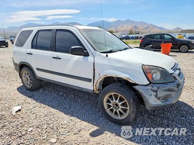 Czwarte zdjęcie samochodu z boku: 2004 HONDA CR-V LX VIN:JHLRD68474C022512 - miniatura
