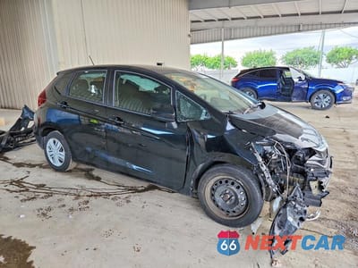 Czwarte zdjęcie samochodu z boku: 2019 HONDA FIT LX VIN:3HGGK5H40KM706819 - miniatura