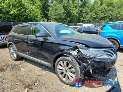 Czwarte zdjęcie samochodu z boku: 2016 LINCOLN MKX RESERVE VIN:2LMTJ8LP2GBL67492 - miniatura