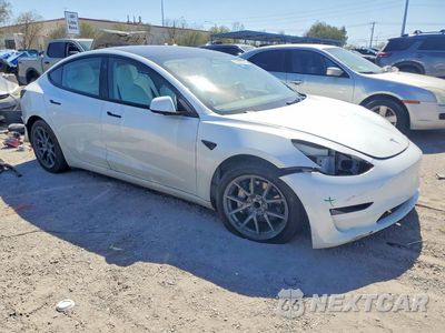 Czwarte zdjęcie samochodu z boku: 2023 TESLA MODEL 3 VIN:5YJ3E1EA5PF541840 - miniatura