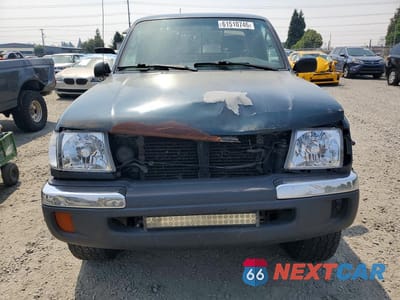 Piąte zdjęcie samochodu w środku: 1998 TOYOTA TACOMA XTRACAB VIN:4TAWN72N8WZ099972 - miniatura